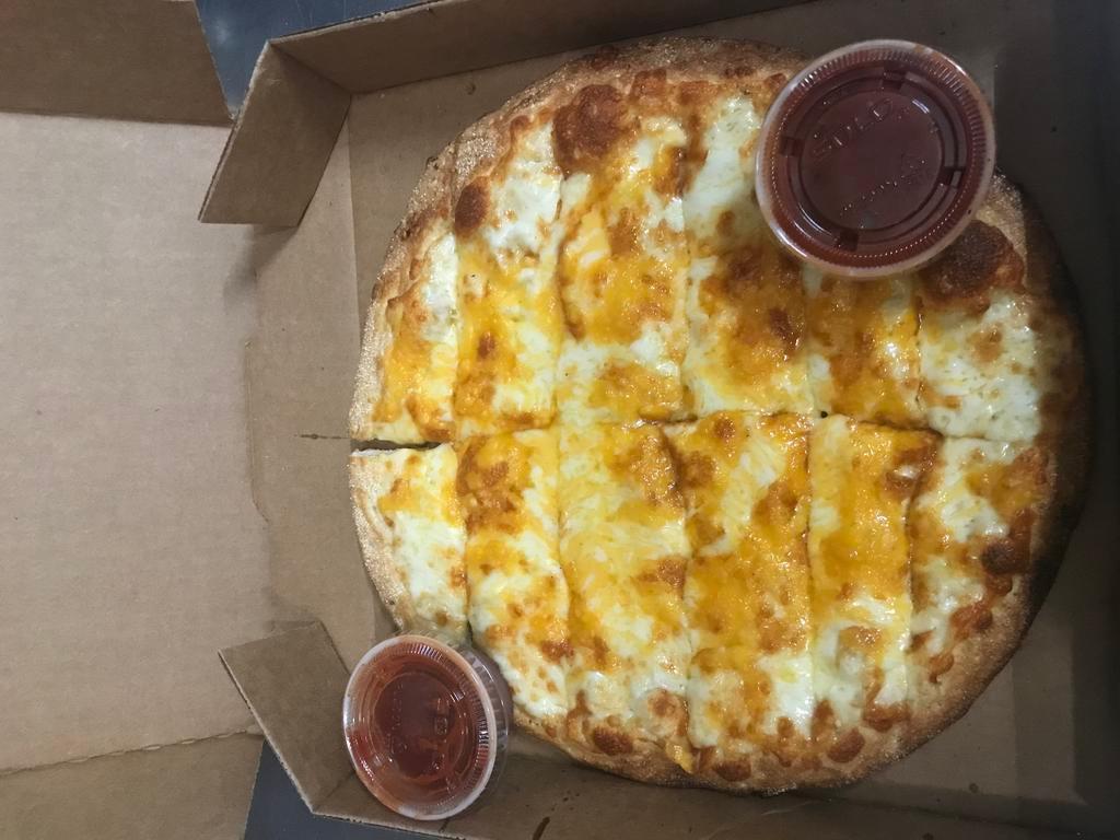 Cheesy Bread · Homemade dough topped with cheddar and mozzarella cheese, served with marinara sauce.