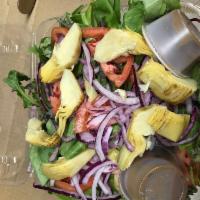 House Salad · Mixed greens, artichokes, tomatoes and red onions with balsamic vinaigrette dressing. Served...