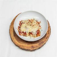 Lasagna · Layers of pasta with homemade marinara sauce, sauteed ground beef, mozzarella and ricotta ch...