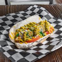 The Chicago Dog · Neon relish, onion, tomato, pickle, sport peppers, celery salt, and mustard.