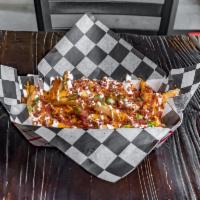 Loaded Fries · Loaded with cheddar, bacon, sour cream and scallions.