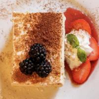 Tiramisu · Coffee and Liquor-soaked layers of lady fingers with sweet mascarpone cream