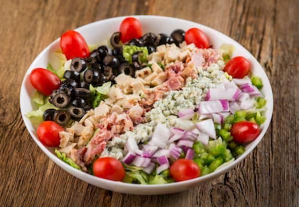 Chopped Salad · Romaine lettuce, pasta, chicken, bacon, Gorgonzola, red onion, green pepper, grape tomatoes and croutons.