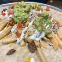 California Burrito · Choice of meat, fries, spanish rice, choice of beans, salsa fresca, guacamole, sour cream an...