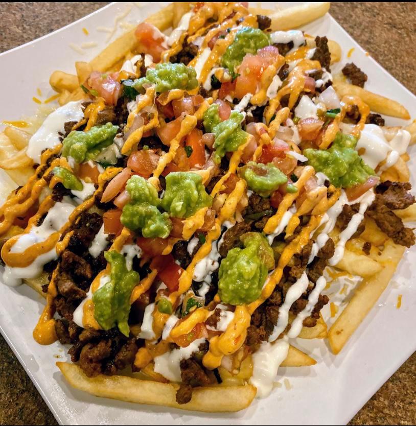 Carne Asada Fries · Fries loaded with Jack and Cheddar Cheese, Carne Asada (Steak) Meat. Salsa Fresca, Sour Cream, Chipotle Aioli, and Guacamole.