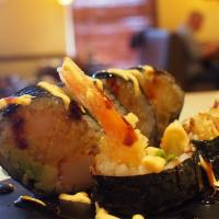 43-Super Fat Boy · 2 tempura shrimps, crab meat, cucumber, avocado and finished w/spicy mayo and eel sauce.