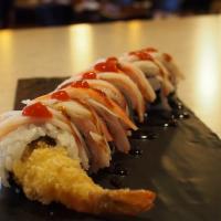 53-Angel List · 2 Tempura shrimp, cheese and jalapeno inside, pink soy paper, crab meat on top spicy eel sau...