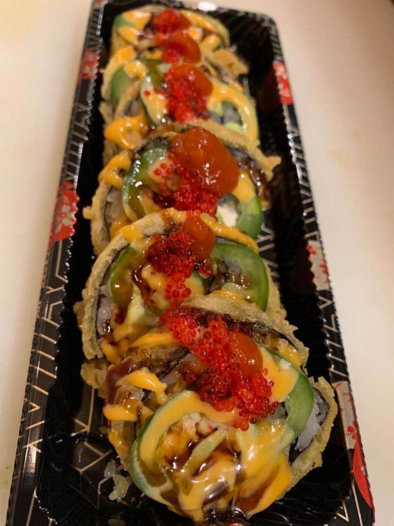 63-Red Devil Roll · Deep fried spicy snow crab, cream cheese, avocado topped with eel sauce, spicy mayo, shiracha sauce, masago, scallion jalapano chopped.