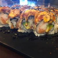 69-Fire Dragon · Salmon, white tuna, avocado, crab meat, topped with spicy tuna, coming with rice seasoning, ...
