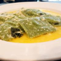 Spinach raviolis · spinach raviolis in a butter and sage sauce
