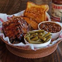 Shack Sampler Plate · 3 baby back ribs, 2 tenders, & 4 oz. of pork or chicken. Served with 2 sides and Texas toast.