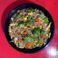 Veggie Fried Rice · Brocoli, corn, peas, carrots, and soybeans