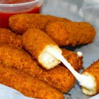 Mozzarella Sticks · Breaded mozzarella sticks deep fried to a golden brown and served with marinara sauce.