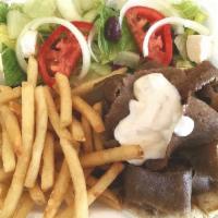 Gyros Plate · Piles of sliced gyros meat topped with tzatziki sauce, tomatoes and onion on a pita. Served ...