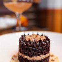 German Chocolate Cake · toasted coconut crème anglaise, candied pecans