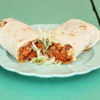 11. El Burrote · Biggest burrito. Savory pork, beans, rice, lettuce, tomatoes, cheese, and chile.