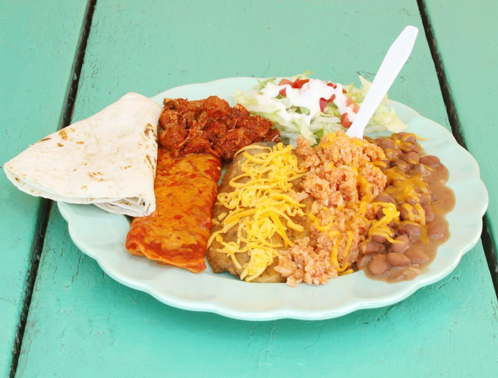 Acapulco Combo · Chile relleno, enchilada, and red carne adovada. Served with a salad, flour tortilla, and a side of rice and beans.