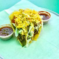 Taco (shredded beef) · Shredded Beef, lettuce, cheese, and tomatoes. Served with a side of salsa.