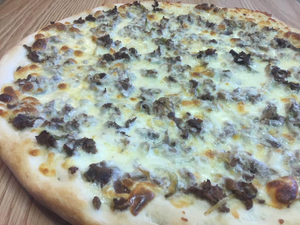 Philly Steak Pizza · Loaded with steak, onions, mushrooms, peppers, American and mozzarella cheese. No sauce. Baked in a stone oven.