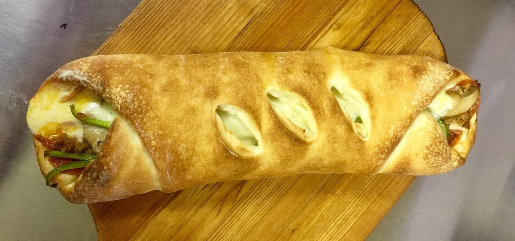 Stromboli · Made with mozzarella cheese, pepperoni, green peppers and ham.