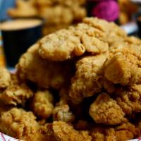 20 Pieces Tendeez · Fried chicken tenders served with fly sauce.  Choose ORIGINAL fried chicken or DUNKS  (a hot...