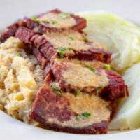 Corned Beef and Cabbage · Corned beef brisket braised in Smithwicks and served with cabbage, drizzled with white wine ...
