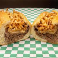 Hot Beef and Cheddar  · Au jus dipped and griddled roast beef, cheddar, horseradish cream, grilled and fried onions. 