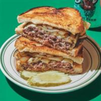 Patty Melt Sandwich  · Double patty, Russian dressing, Swiss and American, grilled onion. 