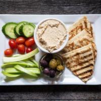 Hummus And Flatbreads · tahini hummus, vegetables, tuscan olives, stack of warm grilled flatbreads