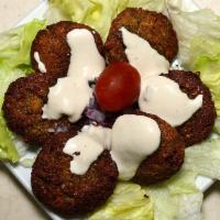 Falafel · Four pieces. Our delicious falafels are made of ground chickpeas and a blend of herbs and sp...