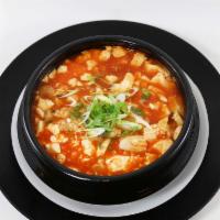 31. Soon Dubu Jjigae · Soft tofu stew with mixed seafood in hot and spicy Korean soup. Spicy.