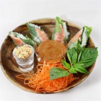 23. Vietnamese Spring Rolls · Chilled rolls, cooked shrimp, lettuce, mint leaf, rice noodles wrapped in rice paper served ...