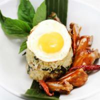 44. Grilled Chicken Basil Fried Rice · Fried rice with fresh basil leaves, eggs and onion topped with egg Sunny Side Up style serve...