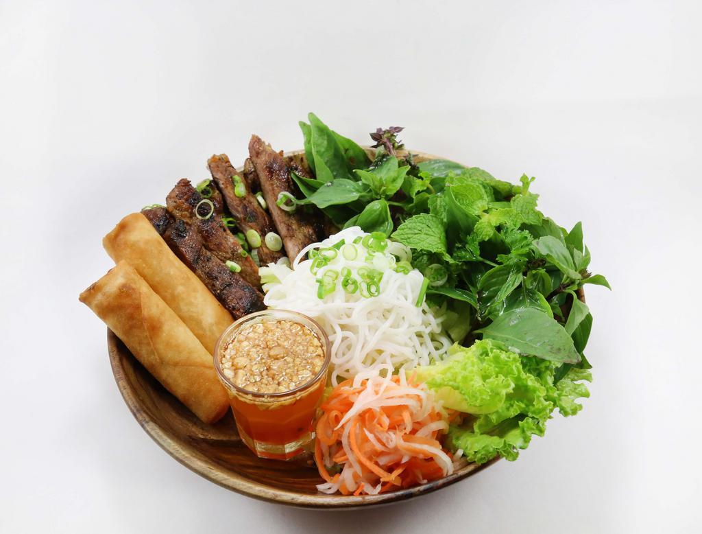 83. Grilled Pork Vermiceli · Rice vermicelli with grilled marinated pork shoulder, crispy spring roll, vegetables served with sweet and sour peanut sauce.