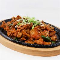 146. Spicy Pork Special (Korean Style) · Stir-fried marinated pork, kimchi, onion with Korean chili paste served with rice.