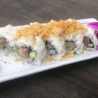 Yellow tail Roll · California roll topped with Yellow tail and Home made special sauce.