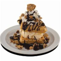 Christie Cookie Waffle · Cookie-stuffed waffle and vanilla ice cream, topped with whipped cream and chocolate sauce.