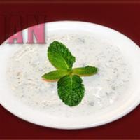 2. Must-o-Khyar · Fine diced fresh cucumber mixed in creamy yogurt with crushed mint.