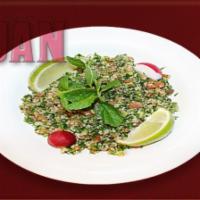 5. Taboli · Mixed fresh parsley, cracked wheat and tomato. Mixed with fresh lemon juice and olive oil.