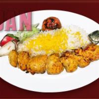 29. Chicken Barg · Flat skewer of juicy marinated grilled chicken breast, with basmati rice topped with saffron.