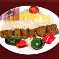 24. Lamb Shish Kabab · Skewers  of marinated chunks of premium lamb, grilled and served with imported basmati rice.