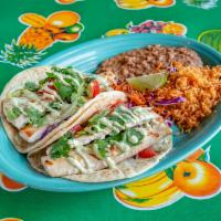 Grilled Fresh Fish Tacos · Grilled fresh fish, shredded lettuce ＆ red cabbage, fresh cilantro, tomatoes ＆ drizzled with...
