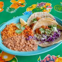 Montego Bay Shrimp Tacos · Crispy fried shrimp with red cabbage, fresh cilantro ＆ drizzled with our avocado ranch sauce...
