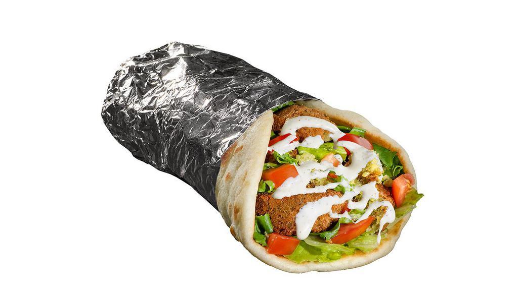 Falafel Sandwich · Our warm pita bread filled with falafel, your choice of toppings and our famous white and hot sauce.