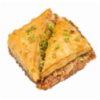Baklava · Chopped walnuts and almonds layered between flaky Fillo Dough sheets, baked then soaked in s...