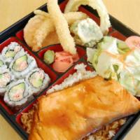 19. Salmon Teriyaki Deluxe Combo · Served with salad, California roll, tempura and rice.