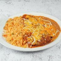 Chiles Rellenos · 2 poblano peppers stuffed with your choice of beef, chicken or cheese, covered with ranchero...