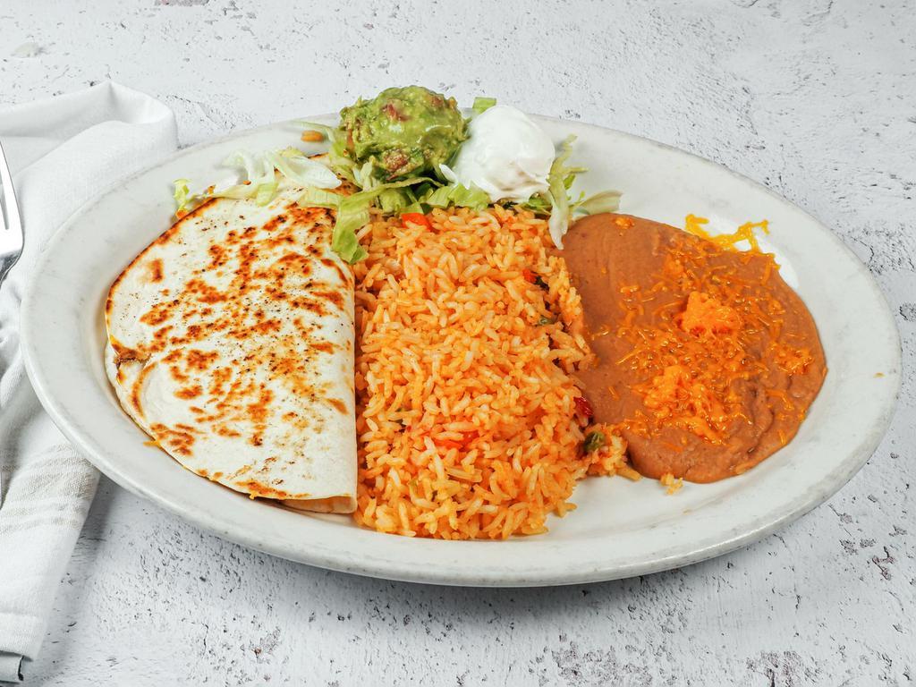 Quesadilla Dinner · 2 quesadillas with your choice of beef or chicken fajita with guacamole or sour cream, served with rice and beans.