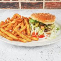 Mexican Hamburger · Served with sliced chili, avocado, tomato, lettuce, cheese and french fries.