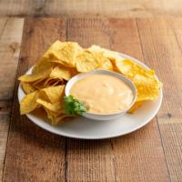 Cheese Sauce and Bag of Chips · 